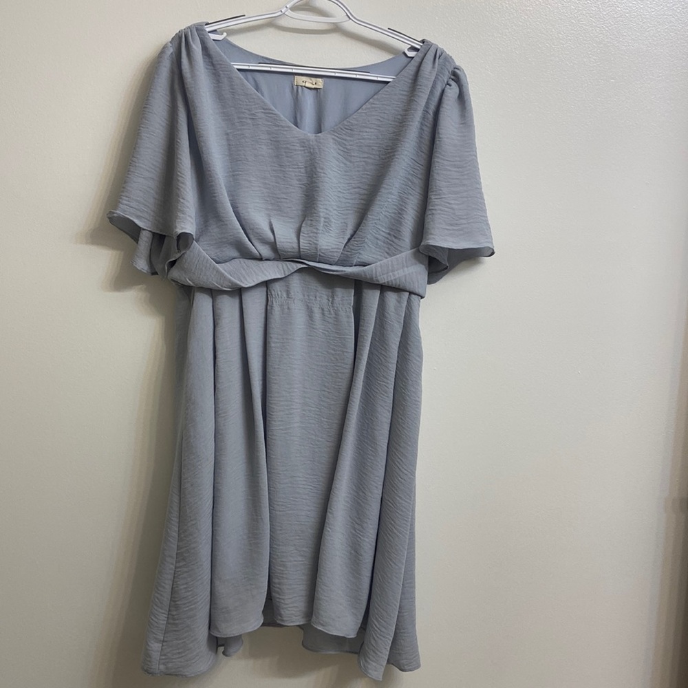 Light blue dress, silky fabric, fully lined. Size 0X.